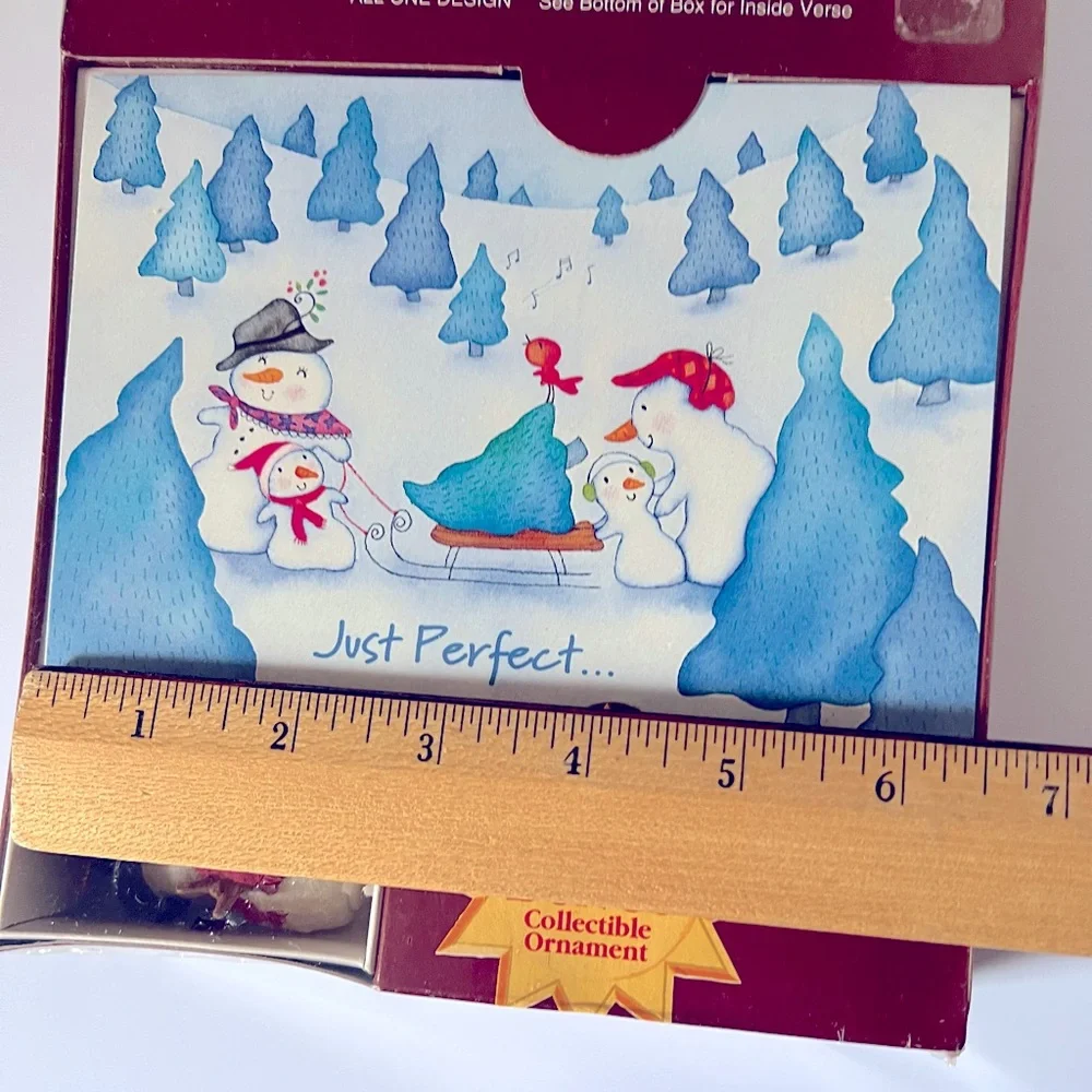 Twenty Vintage Christmas Cards Showing a Snow Person Family in the Snow.